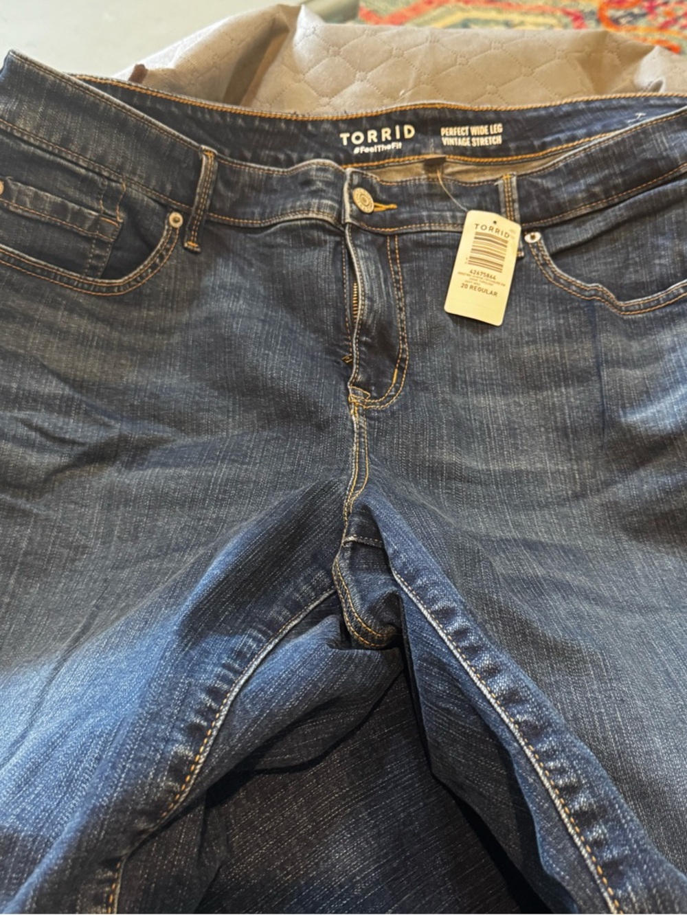 Torrid Dark Blue Wide Leg Jeans with Vintage Whiskering and frayed knees